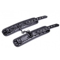 Дизайнерские поножи черного цвета Дизайнерские поножи черного цвета