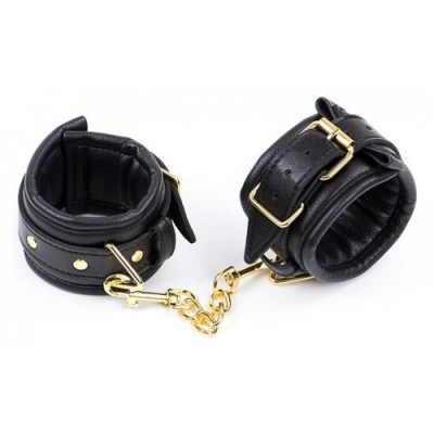 Черные кожаные наручники с золотистой цепочкой Черные кожаные наручники с золотистой цепочкой
