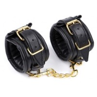 Черные кожаные наручники с золотистой цепочкой Черные кожаные наручники с золотистой цепочкой