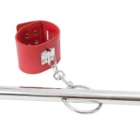 Красная бондажная распорка с наручниками и поножами