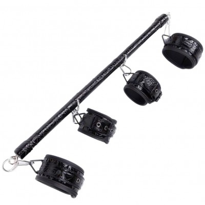 Лакированная распорка черного цвета с наручниками и поножами Лакированная распорка черного цвета с наручниками и поножами