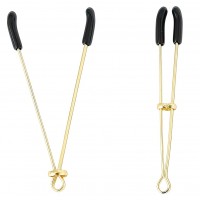 Золотистые зажимы для сосков