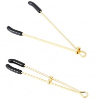 Золотистые зажимы для сосков