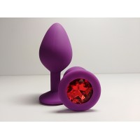 Силиконовая анальная пробка  пурпурная с красным кристаллом S