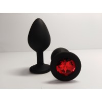 Силиконовая анальная пробка M черная с красным камушком Силиконовая анальная пробка M черная с красным камушком