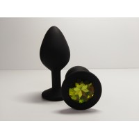 Силиконовая анальная пробка S черная с салатовым камушком