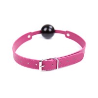 Силиконовый кляп черного цвета на фиолетовом ремне Силиконовый кляп черного цвета на фиолетовом ремне