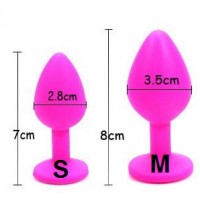 Анальная силиконовая пробка розовая с желтым кристаллом M Анальная силиконовая пробка розовая с желтым кристаллом M